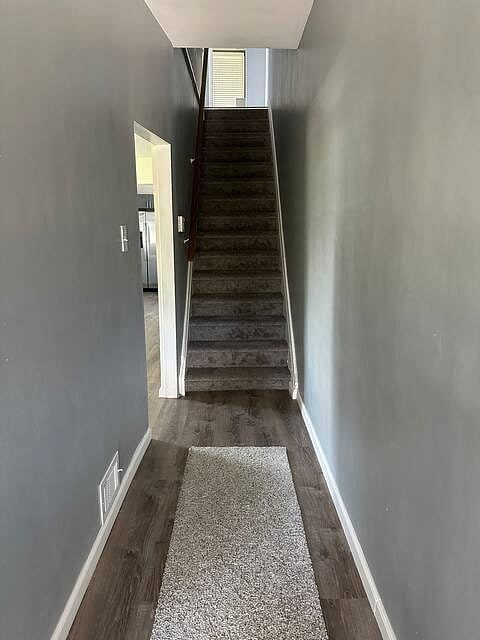 Stairs leading to2nd floor bedrooms & full bath