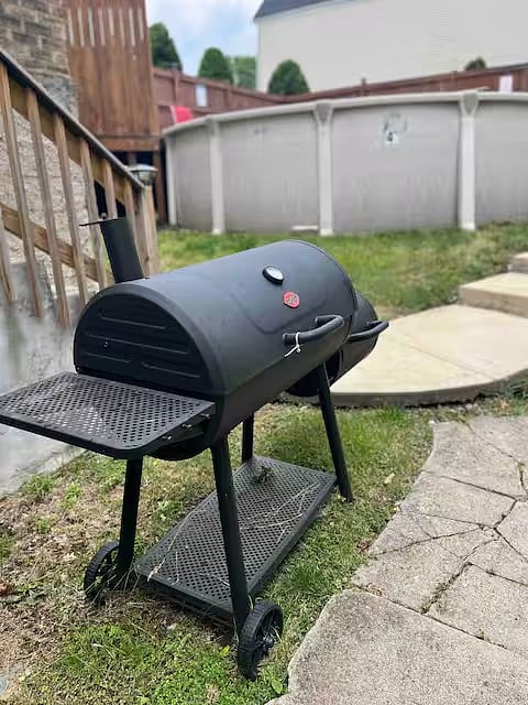 Charcoal grill located in the back yard for your use year around. Grilling utencils provided.