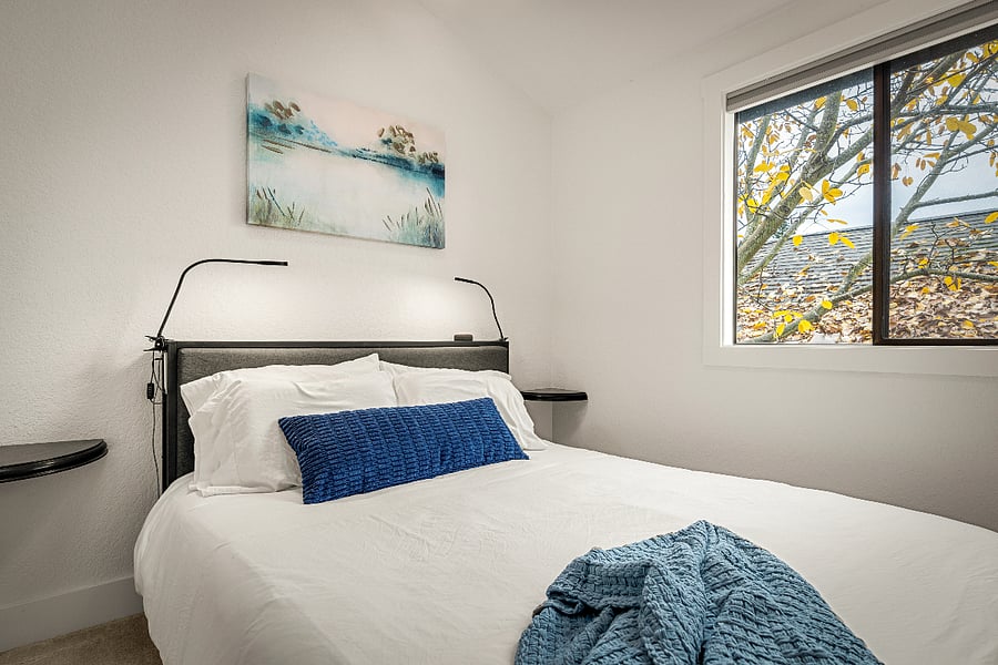 2nd bedroom upstairs fitted with queen bed