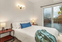 4th bedroom (queen bed) is on main floor with direct access to the deck