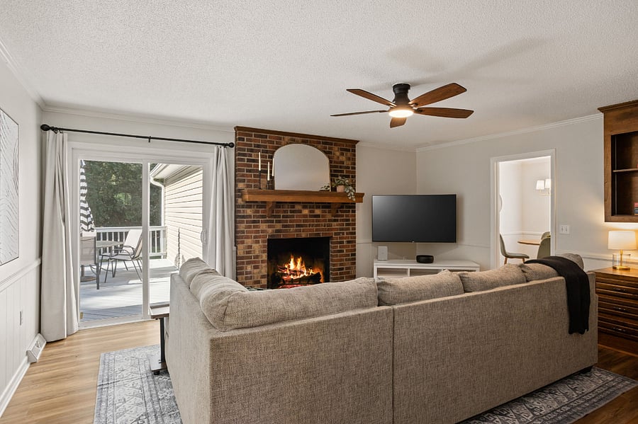Living Room with fireplace, Smart TV and office space