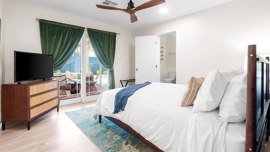 Private Suite with direct patio access, luxe linens and ensuite bath - comfort meets convenience