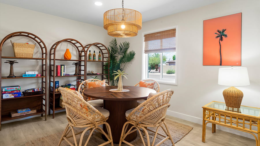 Comfort meets charm in this cozy game table area off the living room