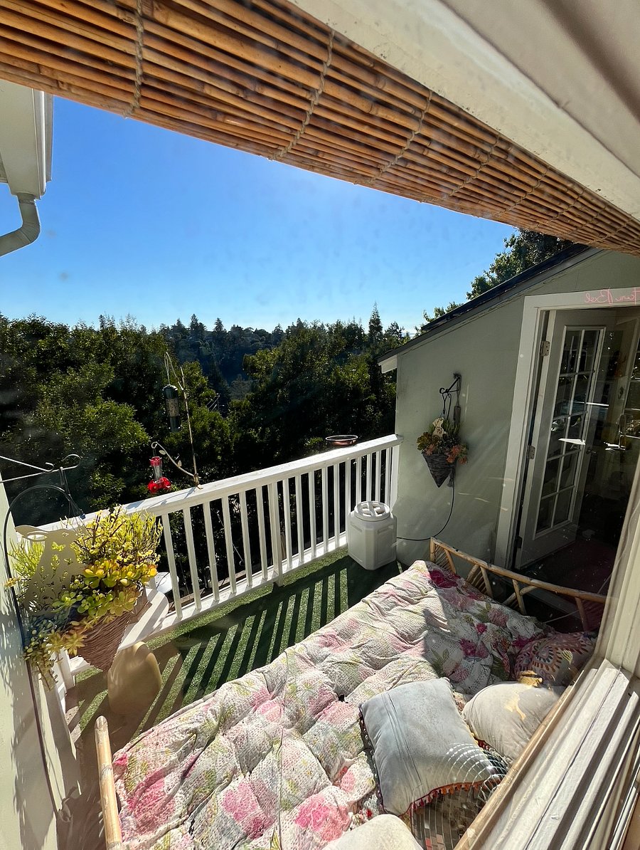 Balcony with daybed off living room
