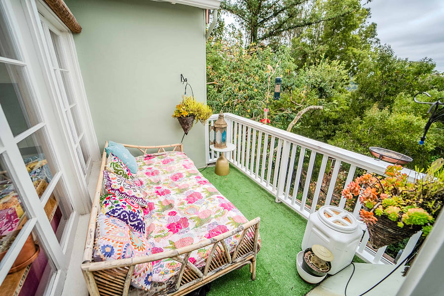 Balcony with daybed off living room