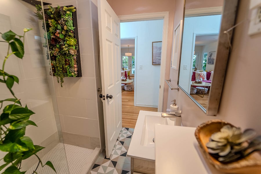 Newly renovated bathroom with glass wall shower