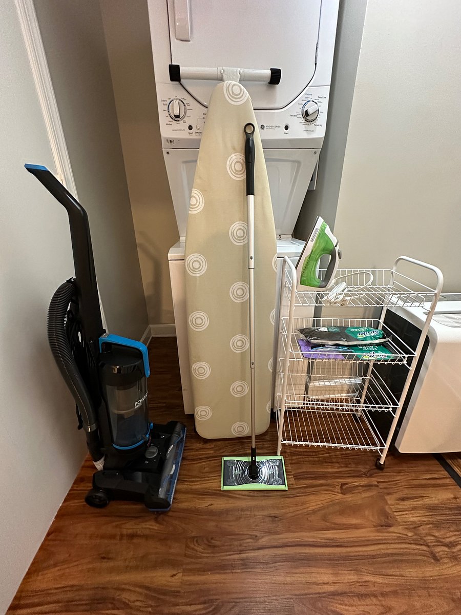 Full-size ironing board & iron. Vacuum & swiffer.