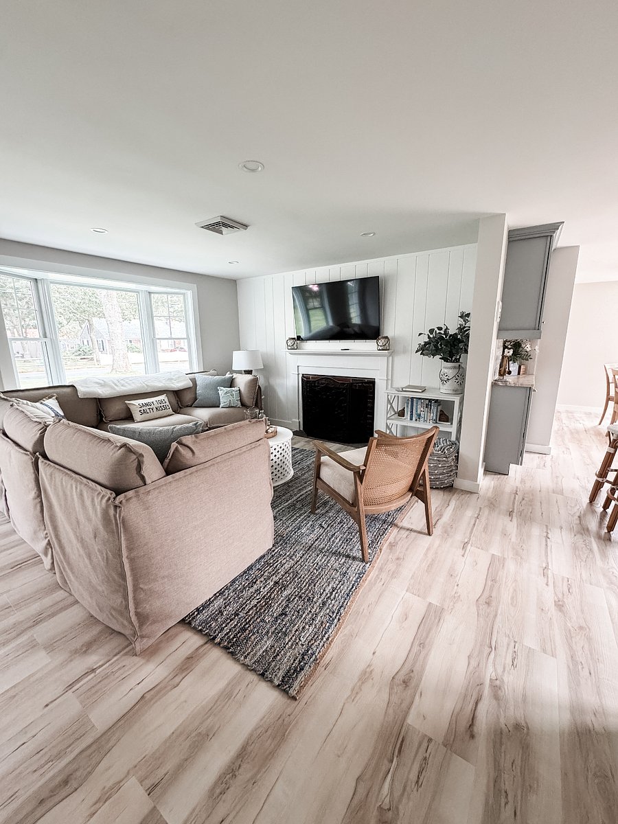 Cozy living area with large sectional and Smart TV.