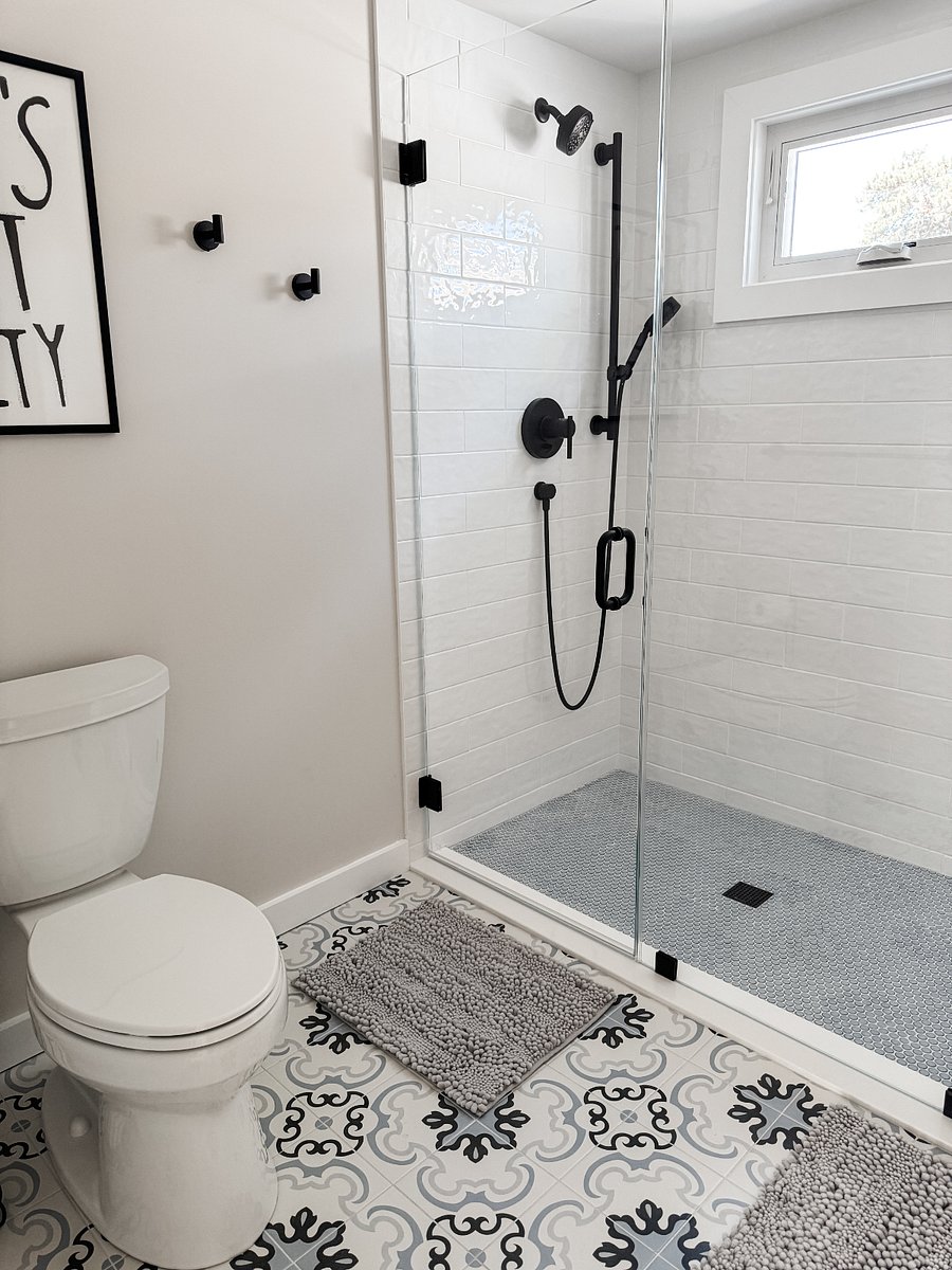 Tile shower with handheld.  No tub.