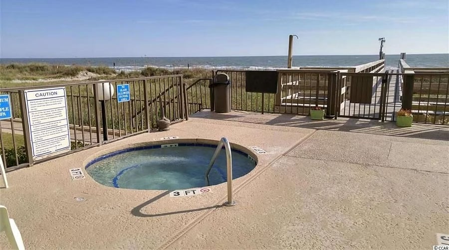 Pool deck hot tub