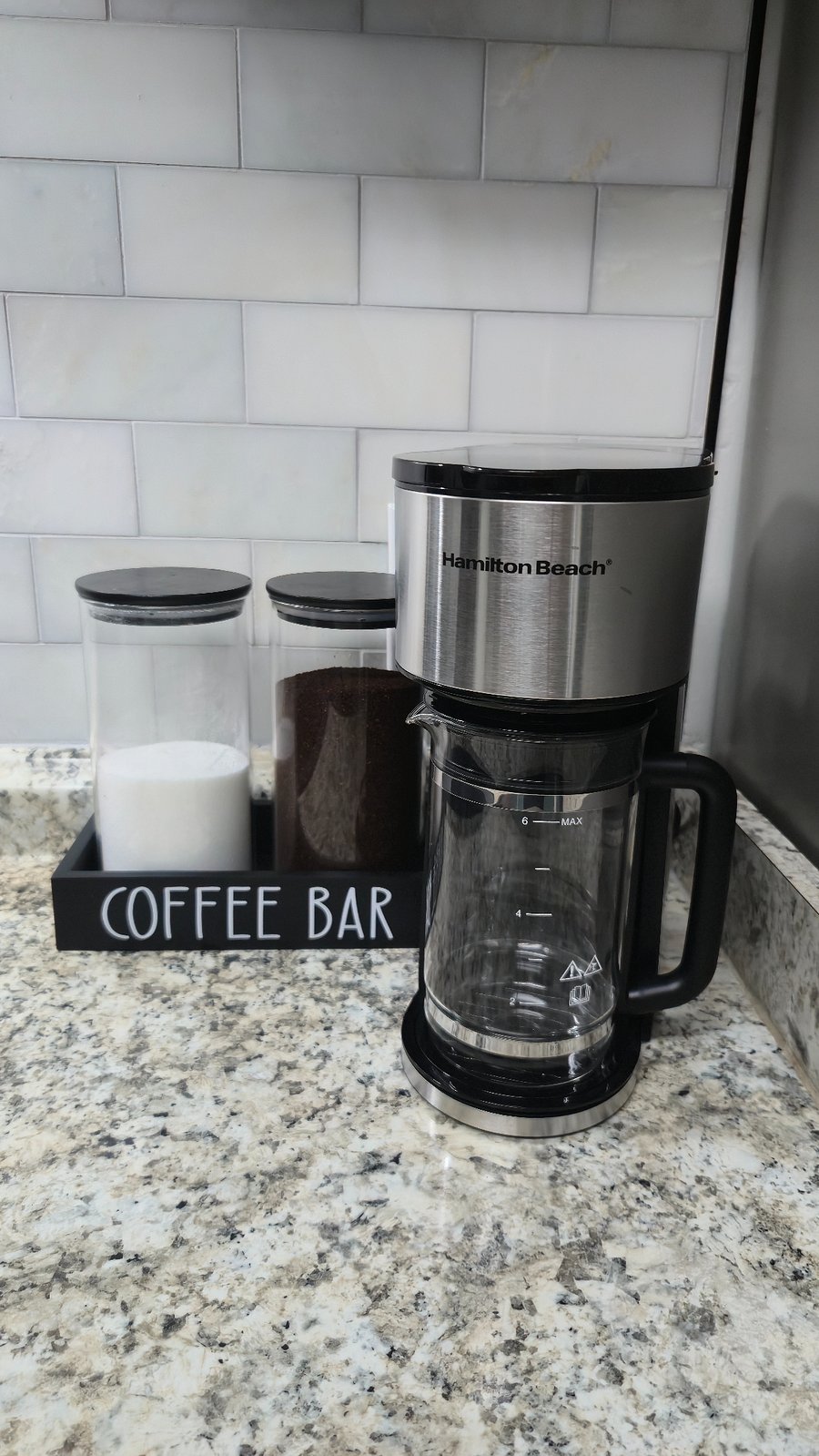 maker pot with coffee and sugar