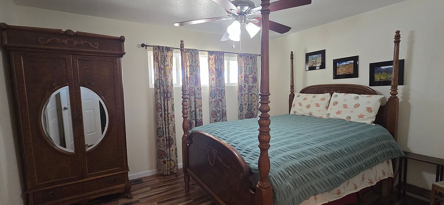 This is the master bedroom with a queen bed.