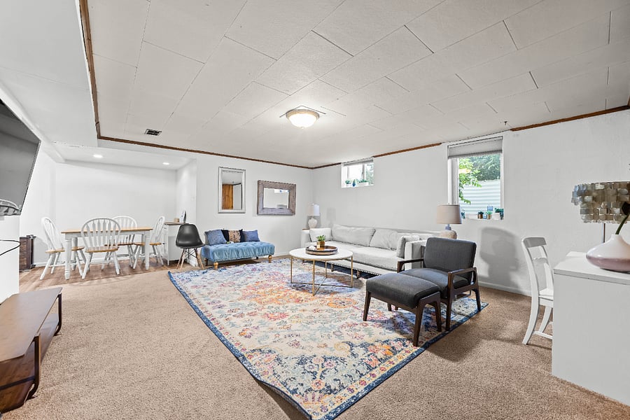 Living and dining areas connected in an open, flexible layout.