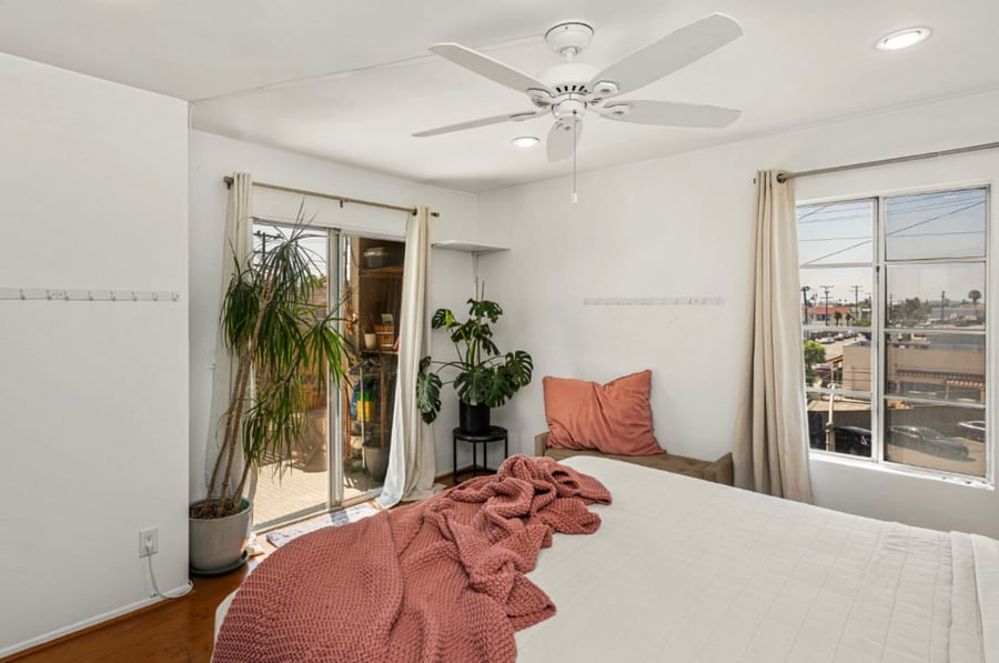 King bedroom w/access to balcony