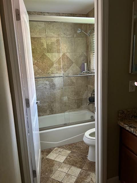 this is our shower bath combo and toilet room