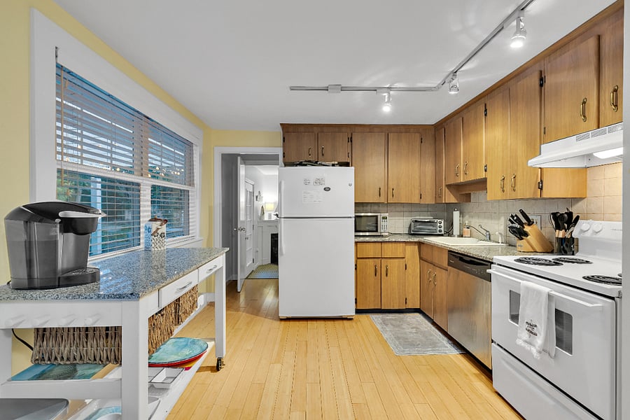 Through the door you will find the home office space.