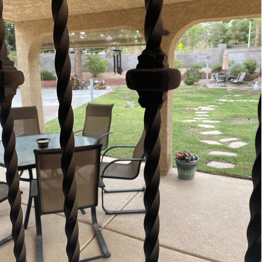 Backyard patio, table and chairs.