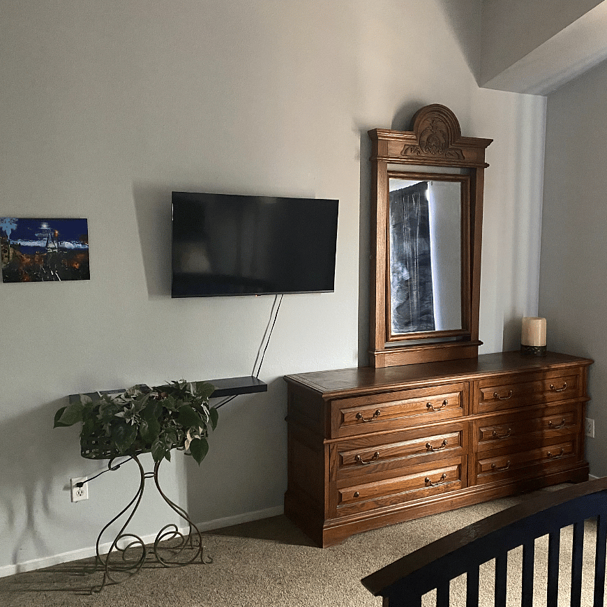 The ceilings are valted in both bedrooms.  There are 2 shelves for pictures, books , etc.