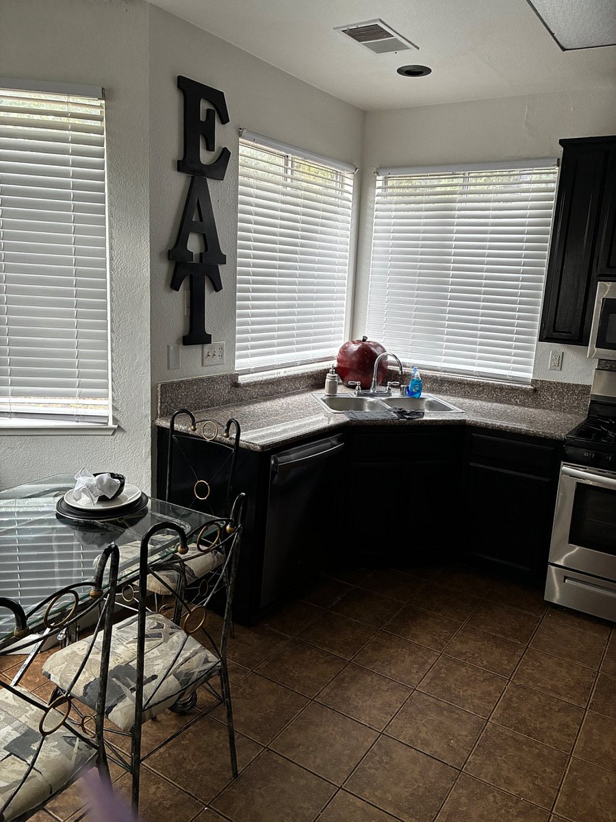 Kitchen work space along with newer stainless steel appliances 