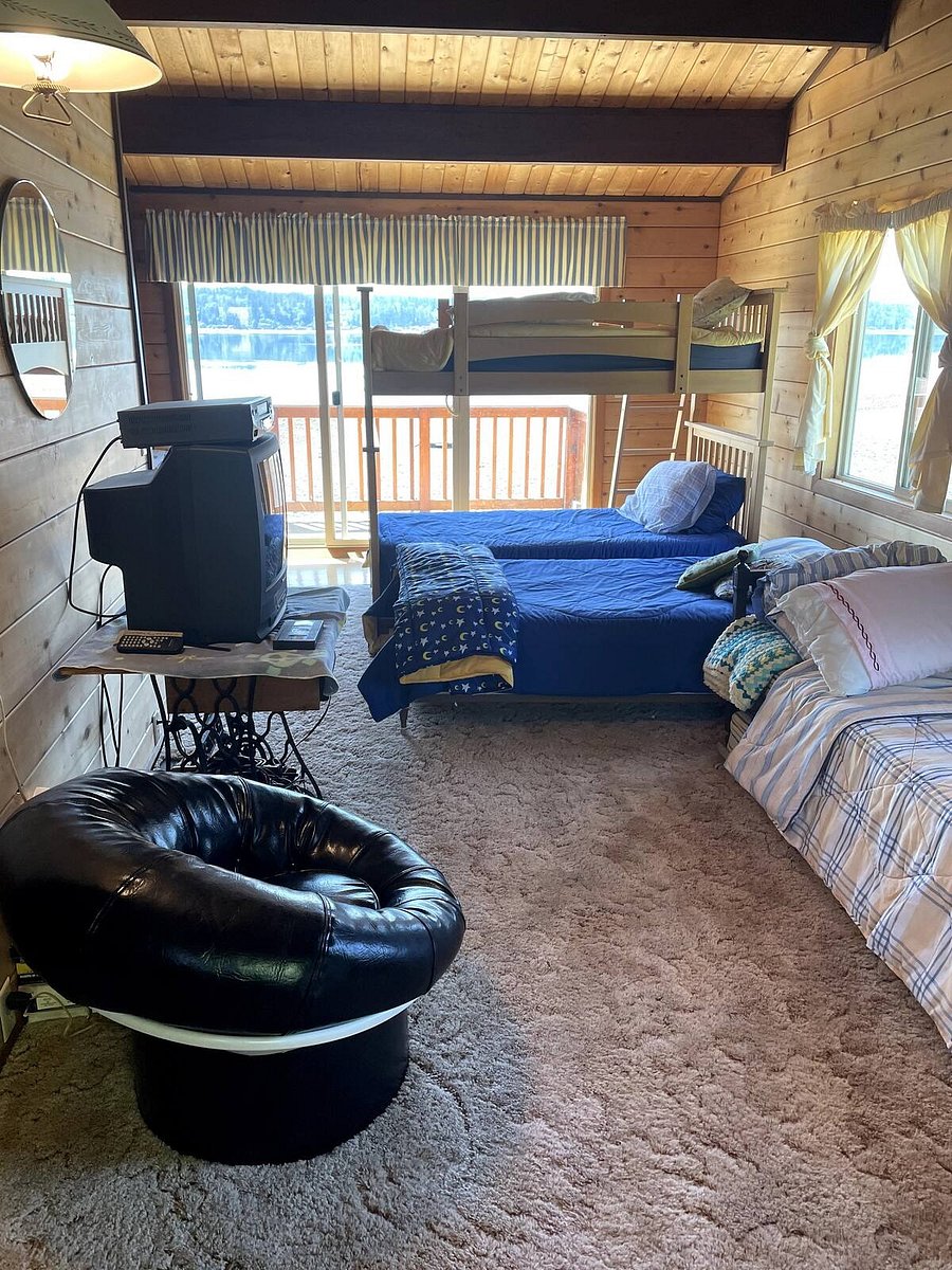 Upstairs bedroom #3. Bunk room with attached deck. Facing Hood Canal.