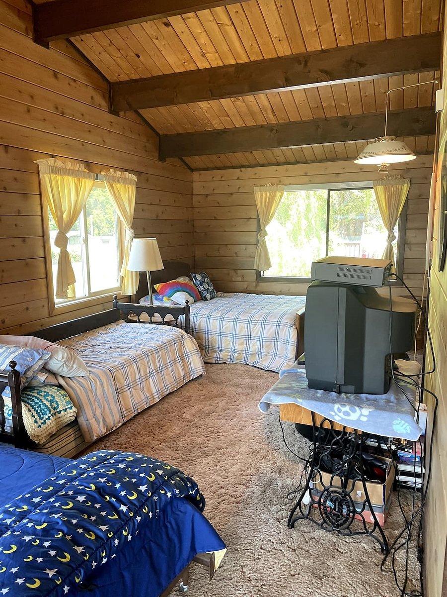 Upstairs bedroom #3. Bunk room with attached deck. Facing Hood Canal.
