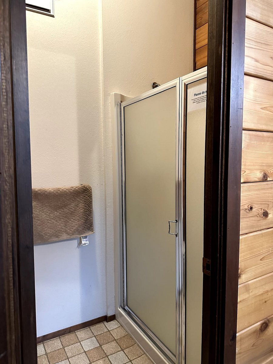 3/4 bathroom upstairs that sits between the bunk room and the second bedroom.