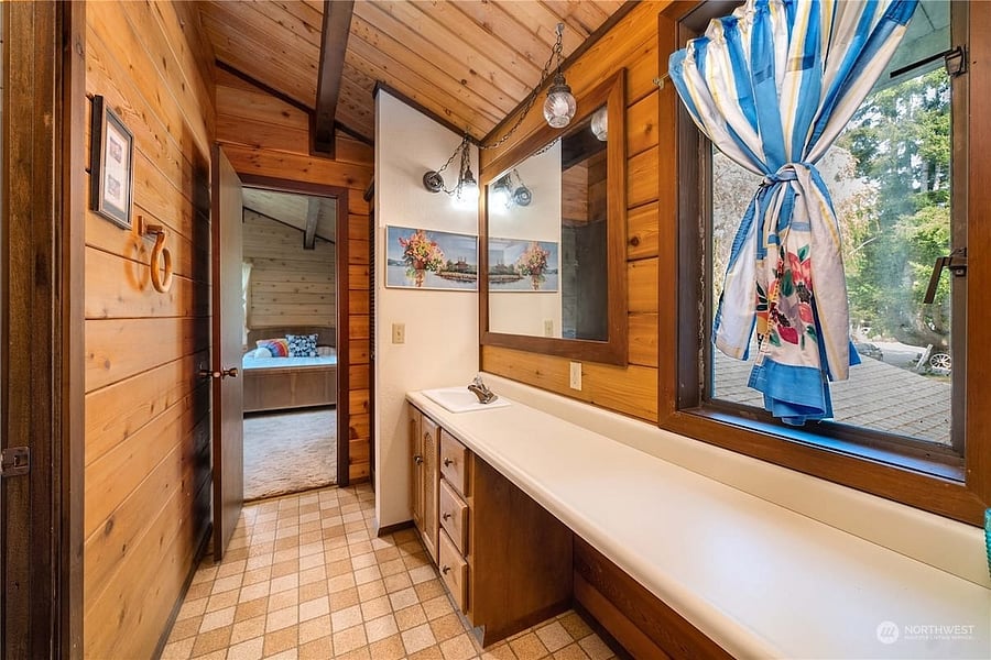3/4 bathroom upstairs that sits between the bunk room and the second bedroom.