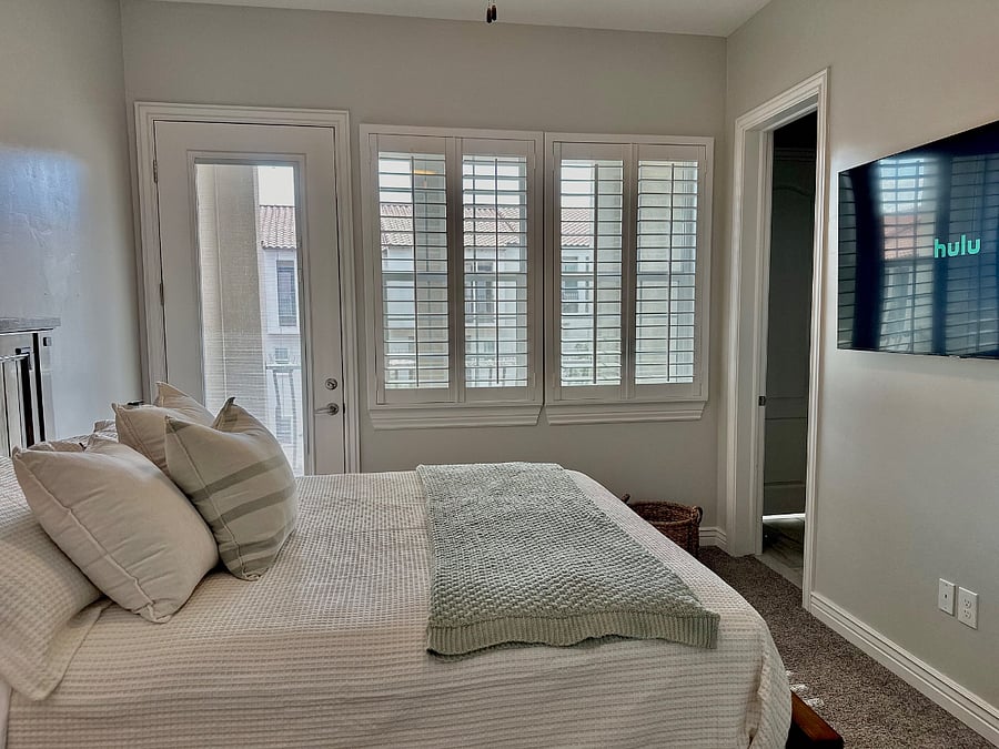 Cozy master bedroom with full bath, walking closet and smart TV.