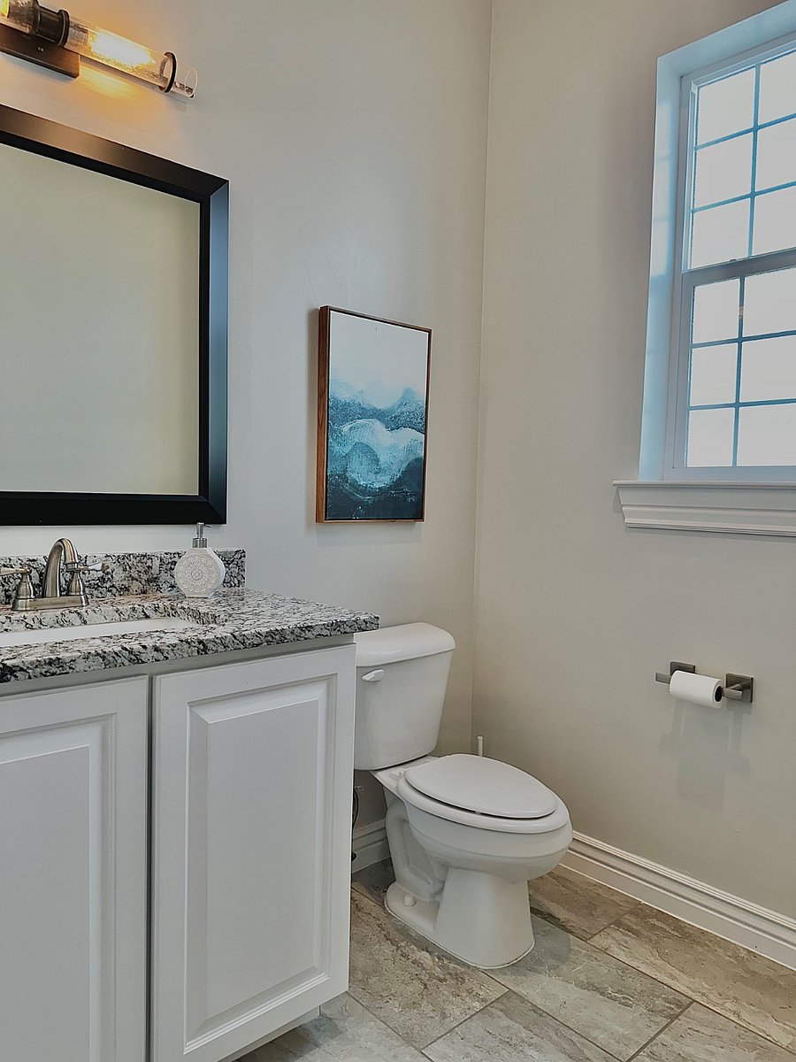 A half bath is located on the second floor and easily accessible from the common living areas perfect for hosting friends or enjoying family gatherings without disrupting the private bedroom spaces.