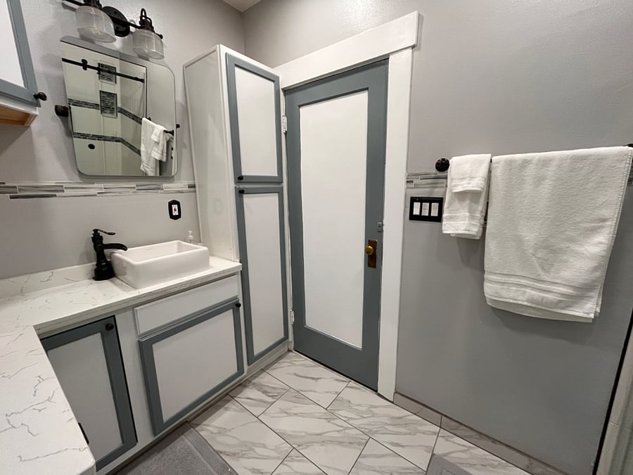 Vessel sink and lots of storage cabinets