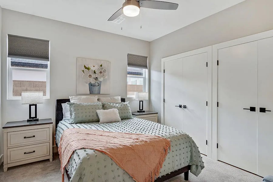 Bedroom 2 has a queen bed. There is no TV in this room and no attached bath but the bathroom in the hallway can be used as the private bath for this room.