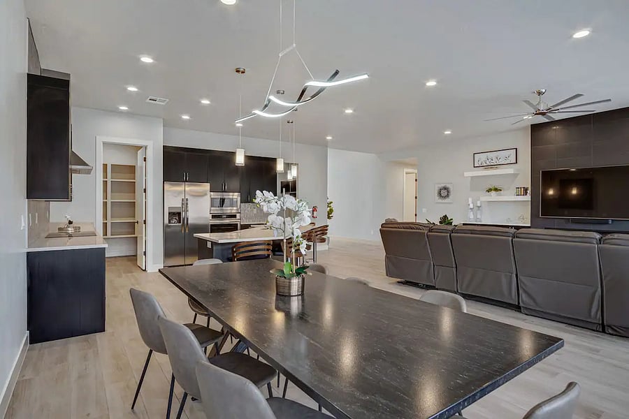 The main kitchen and living room are an open concept design and there is seating for 12+
