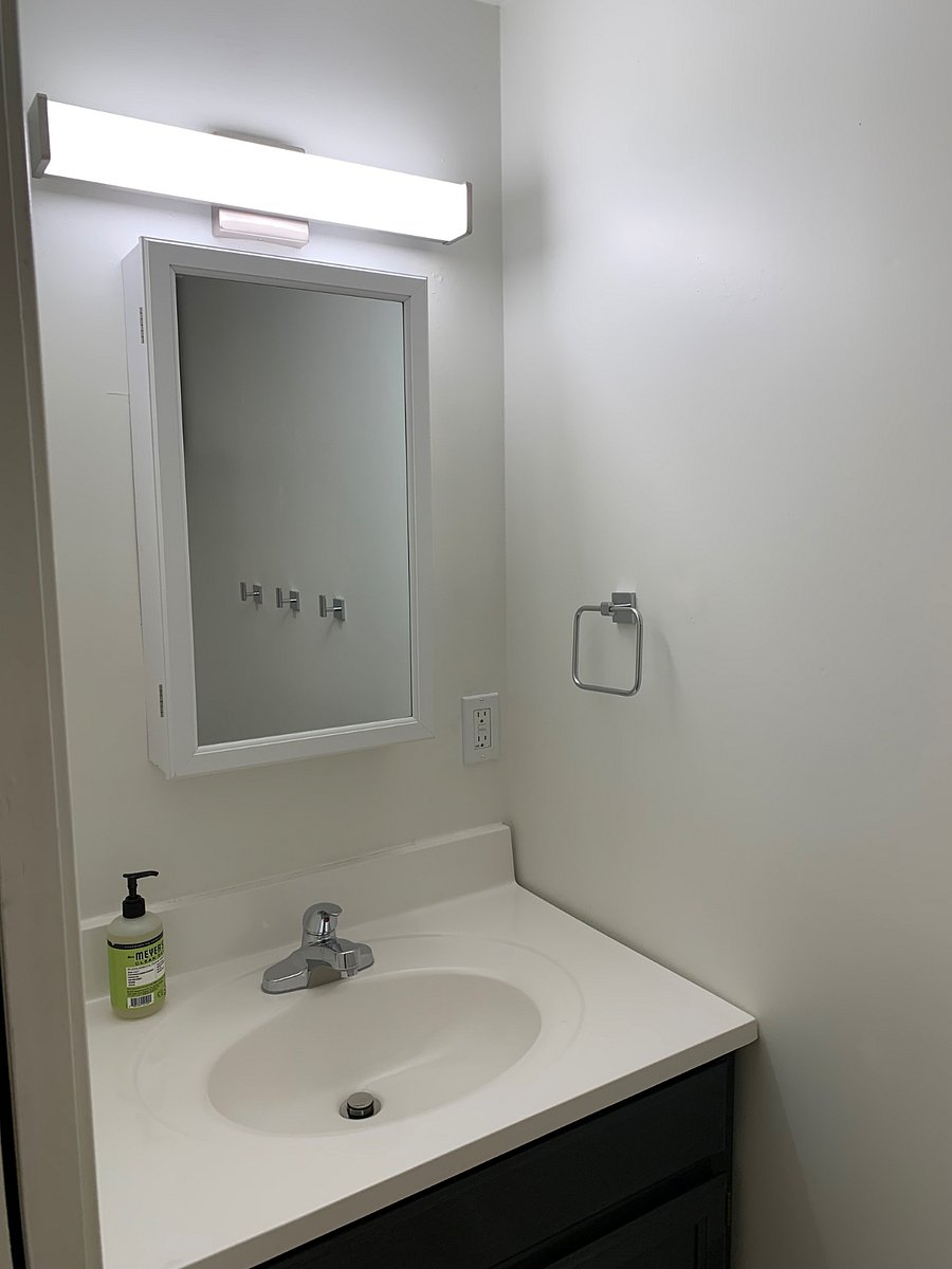 Lower level half bath off of master and bunk bedroom