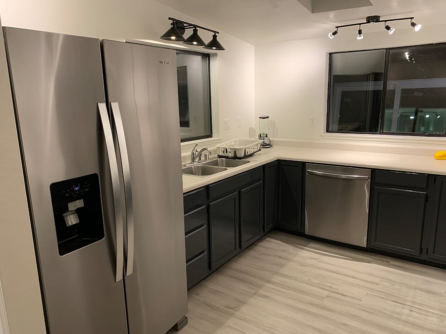 Full size refrigerator with water and ice dispenser and water filter. Full size dishwasher
