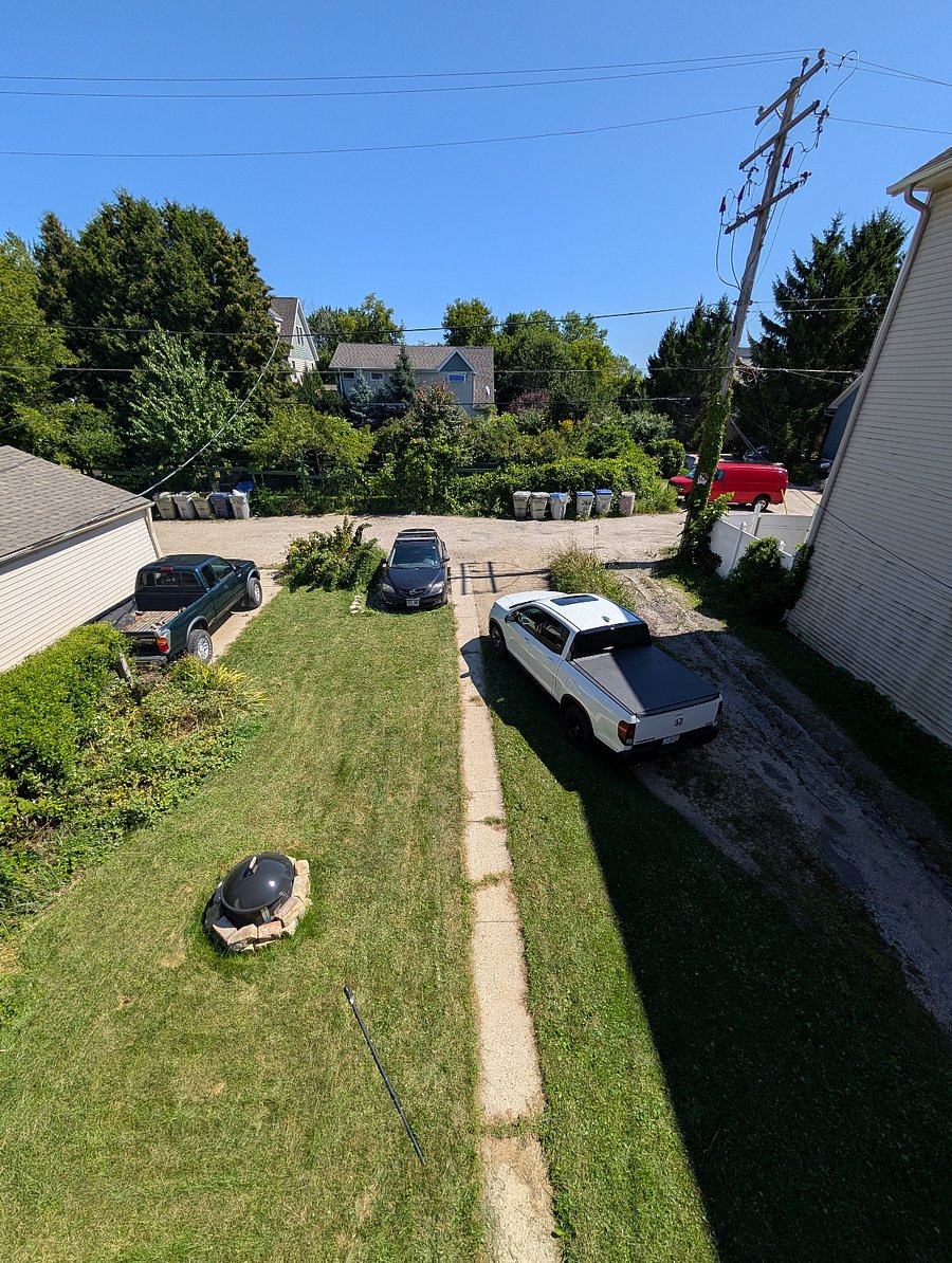 backyard with 2 parking spots that are yours (2 on the right side where the truck is in this photo are yours exclusively)