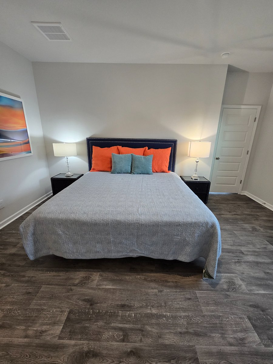 Downstairs primary bedroom with King sized bed
