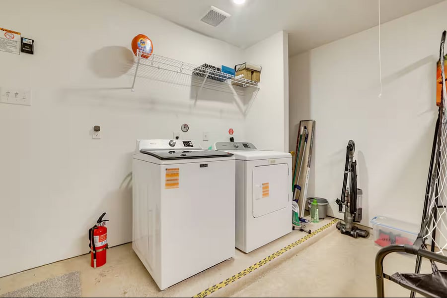 Washer, Dryer and Fire extinguisher in the garage