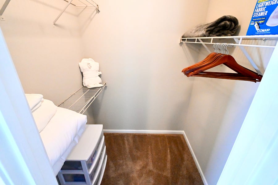 Tower heater/fan located in the second walk-in closet  ready when you need it, tucked away when you dont.