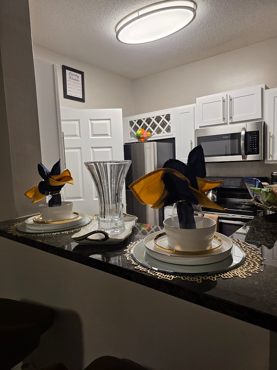 Dressed bar with seating for two  perfect for casual meals, morning coffee, or evening conversation.
