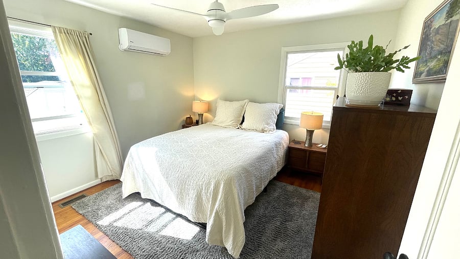 Primary bedroom with queen size bed and full size closet and dressed to store clothes, shoes, luggage, etc.