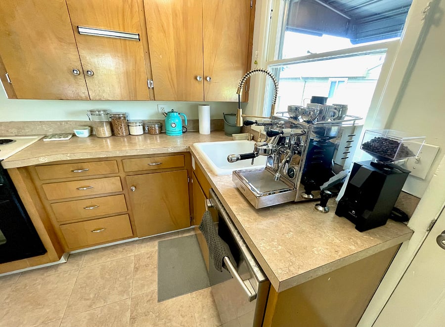 Close up of pretty espresso machine and grinder (we also have a simpler grinder and a French Press for easier use)