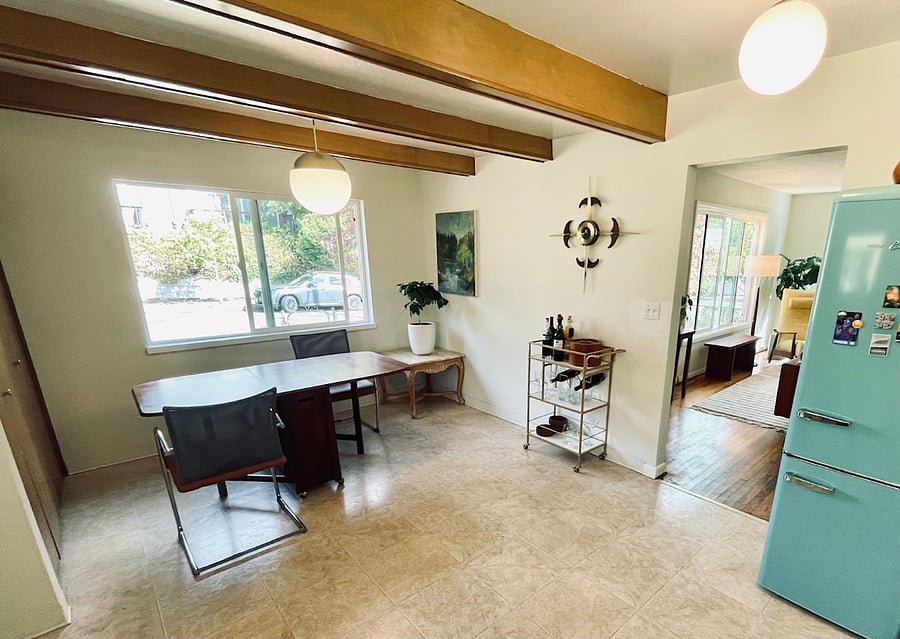 Dining area in kitchen with table to seat 4 or 6 (or it can be folded up and moved to the side for more space)