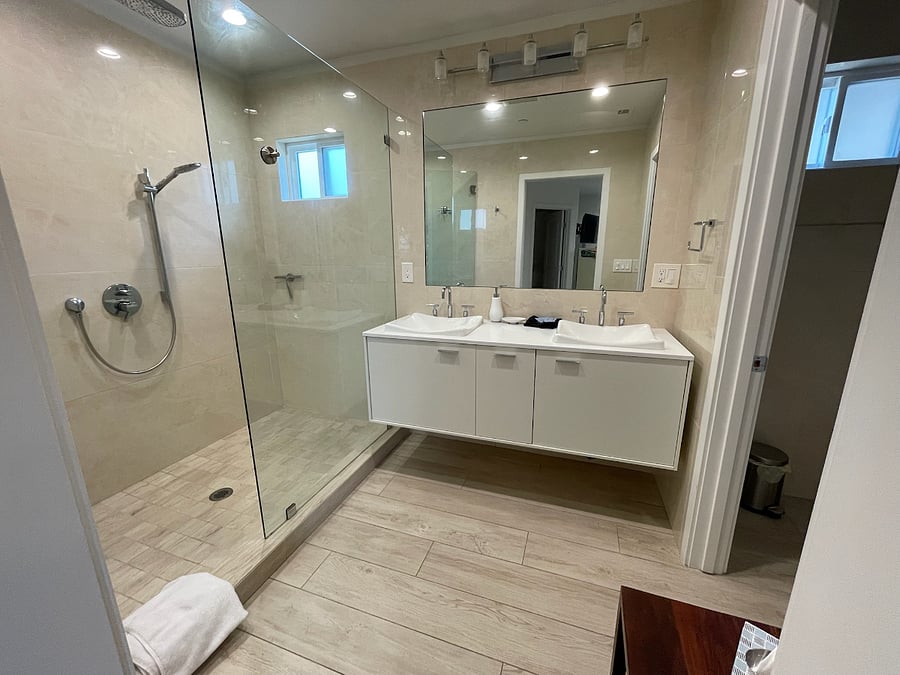 Primary bathroom, rain shower, toilet and bidet