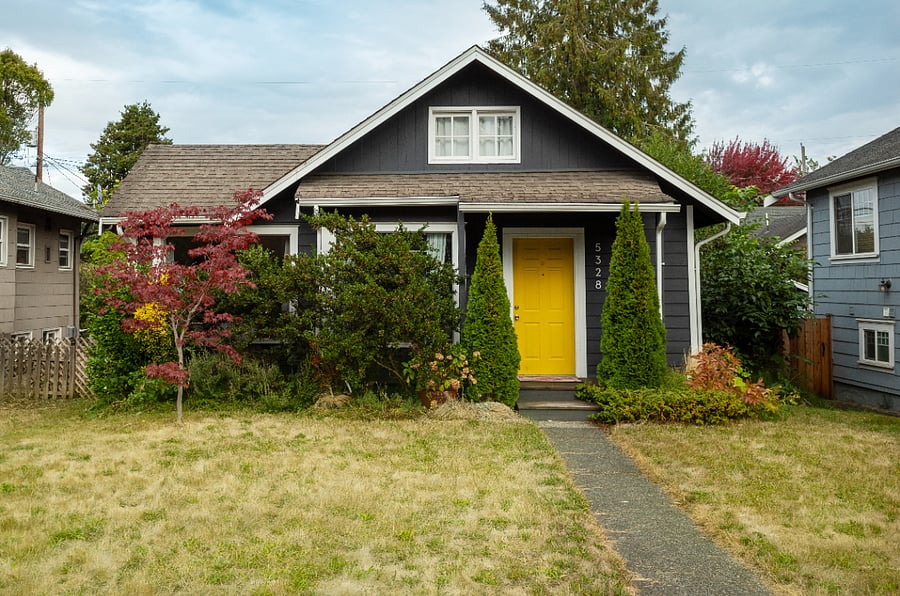 Luscious greenery in the front provide some privacy from the outside world