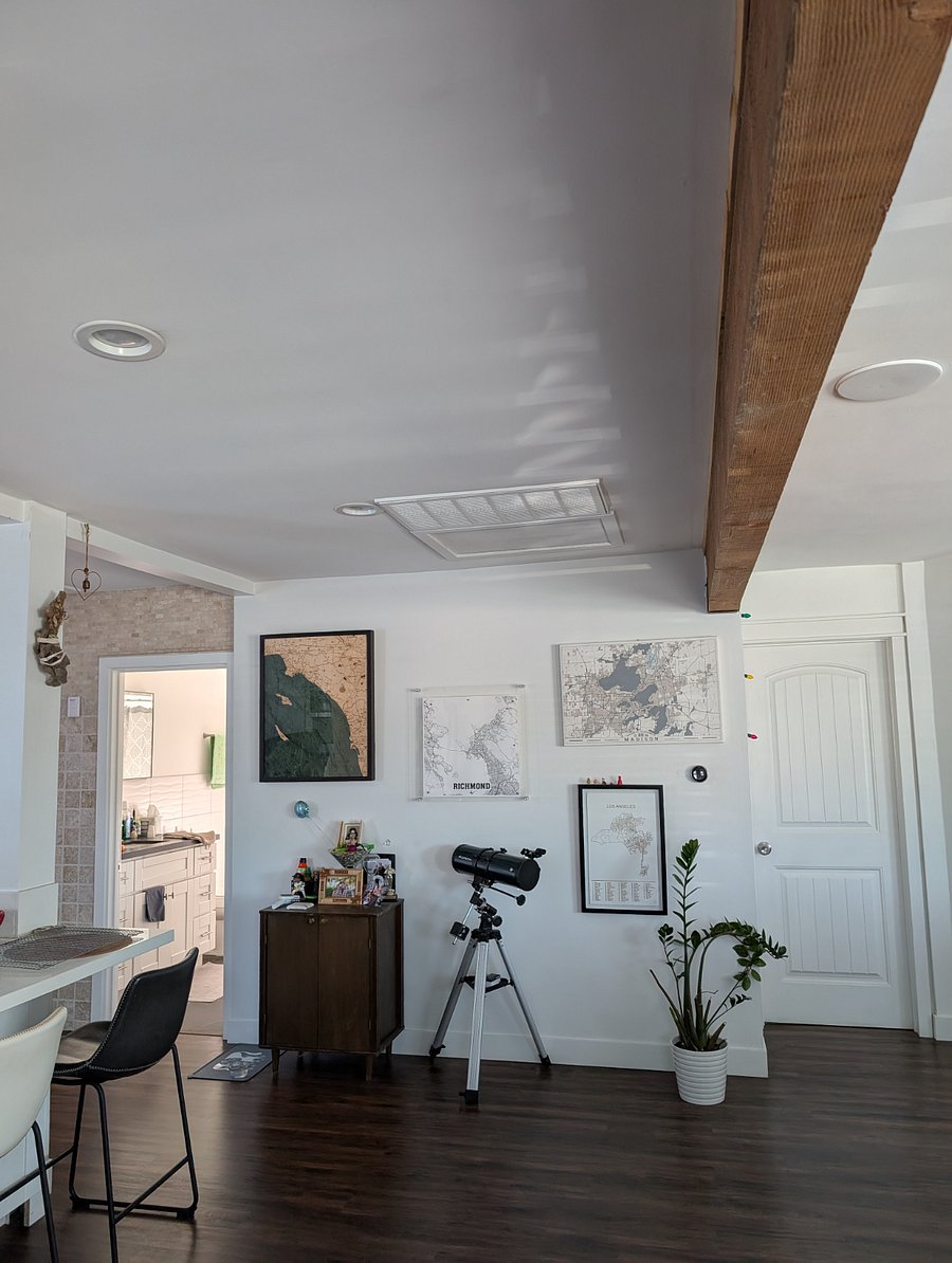 Next to kitchen. Door on right of beam is rental room; door to left of beam is rental bathroom (full bath)