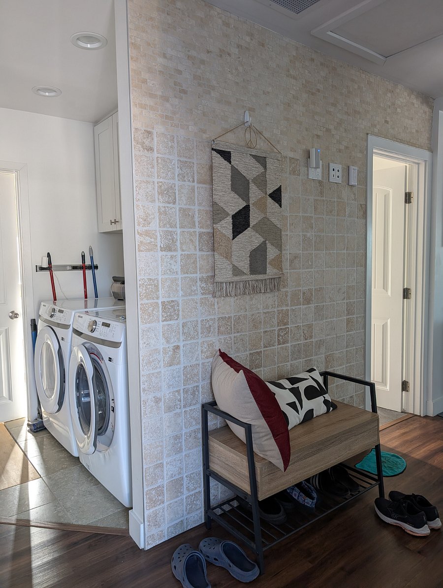 Shared washer and dryer - next to rental bathroom and kitchen