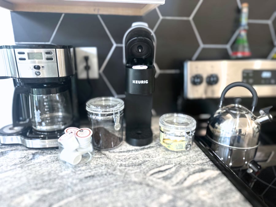 Enjoy a cup of coffee or tea from the coffee bar /tea kettle set up. 