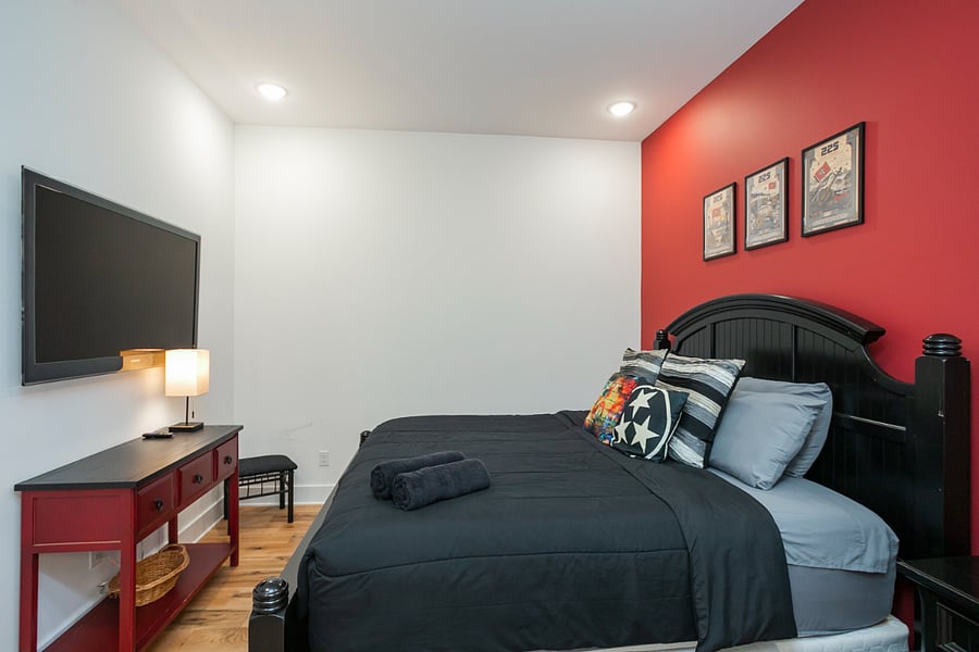 Bedroom two features a king bed, Smart TV and large ensuite bath.