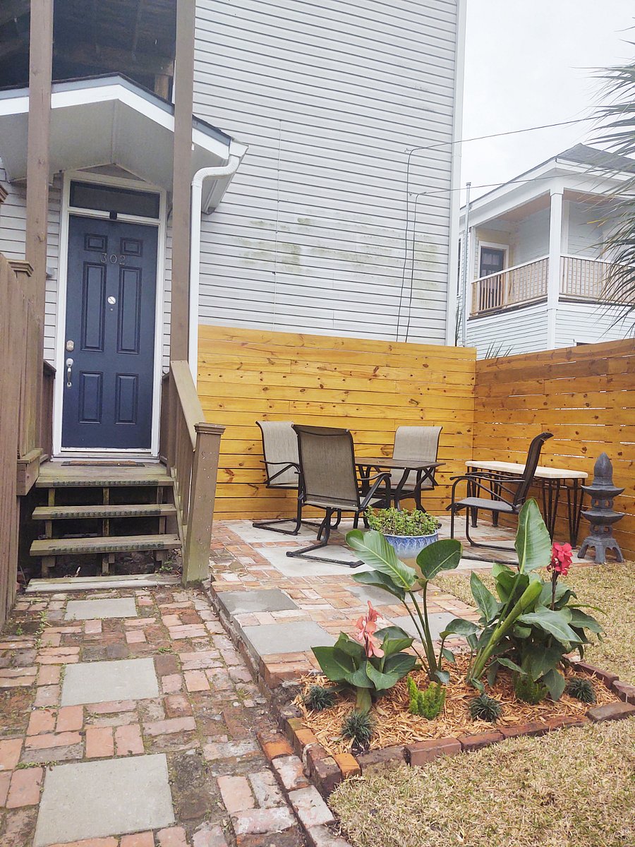 Rear patio seating in courtyard 