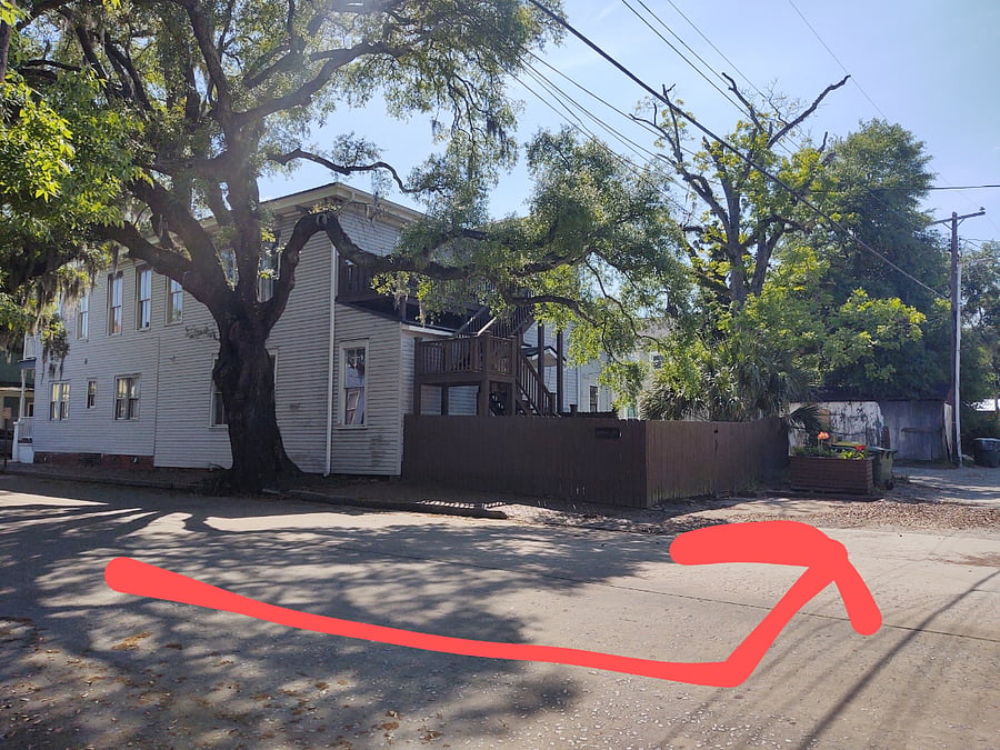 Dedicated Parking Space along back fence / courtyard
